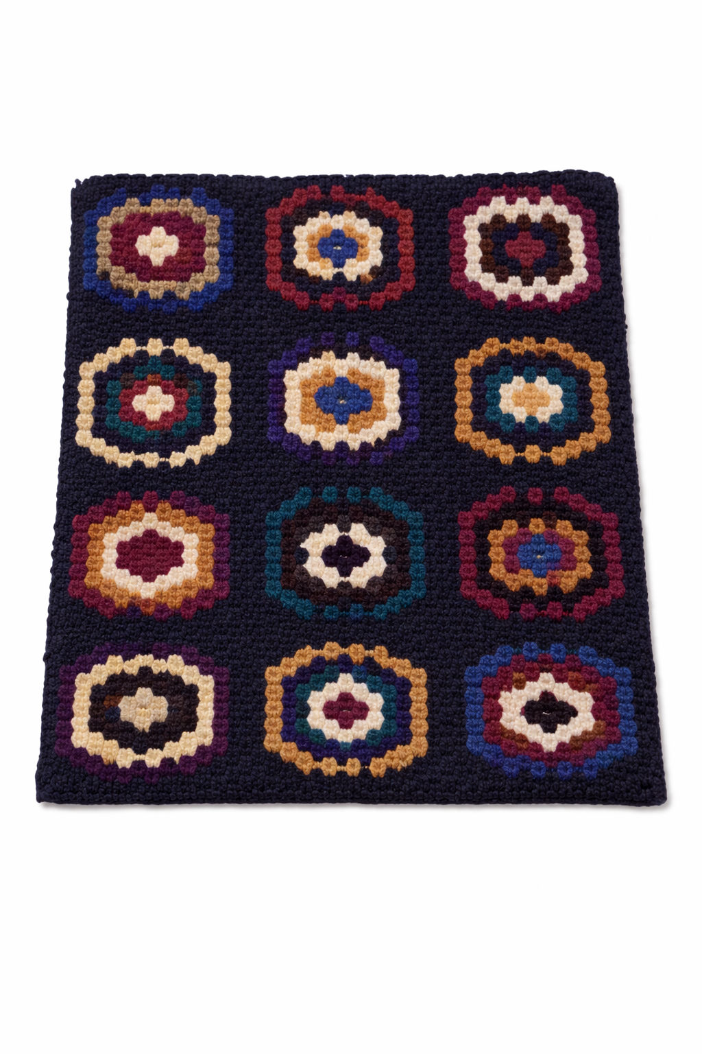 Embroidered tufted knit