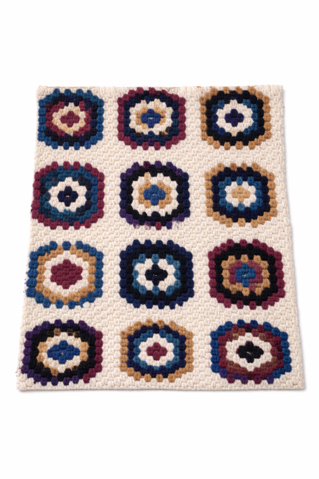 Embroidered tufted knit